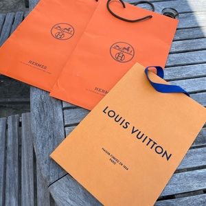 Shopping bags from Hermès and LV